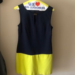 Trina Turk sleeveless dress with front pockets